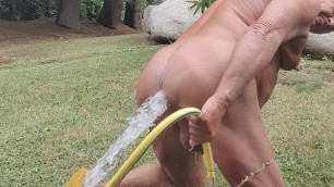 deep washing ass hole outdoors