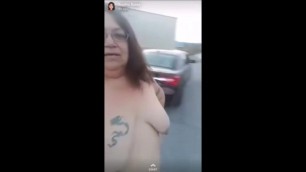 Loves2showall naked outside by the car