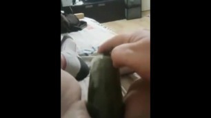 A cucumber in my pussy and I love her