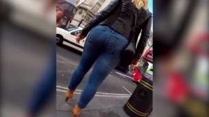 enjoy! Hidden cam spying curvy big ass blonde MILF walking in tight jeans !