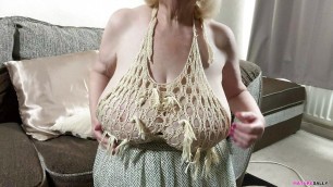 Mature Sally's huge tits in a skimpy top which leaves nothing to the imagination