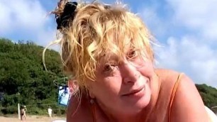 Mature woman on the beach