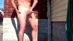 Mature amateur dude rubbing his dick in the driveway