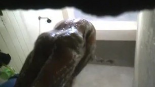 Hot mature slut in bathroom soaping her huge ass and big tits.